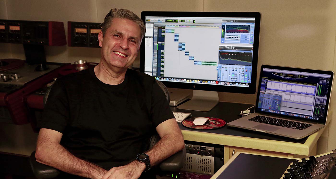 Carlos Freitas sat in studio smiling  Carlos Freitas sat in studio smiling